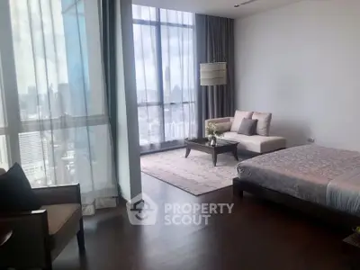 Luxurious bedroom with stunning city view and elegant decor