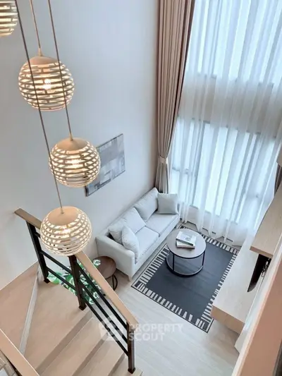 Stunning modern living room with high ceilings and elegant decor