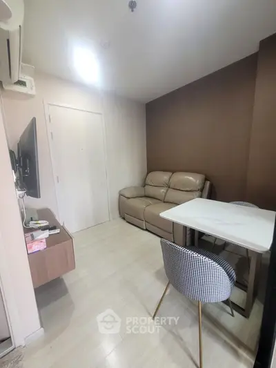 Cozy living room with modern furniture and neutral tones