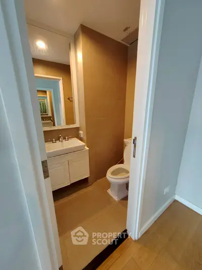Modern bathroom with sleek fixtures and neutral tones