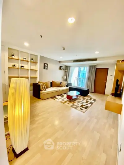 Spacious modern living room with elegant decor and natural light