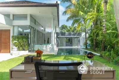 Luxurious tropical villa with private pool and lush garden view