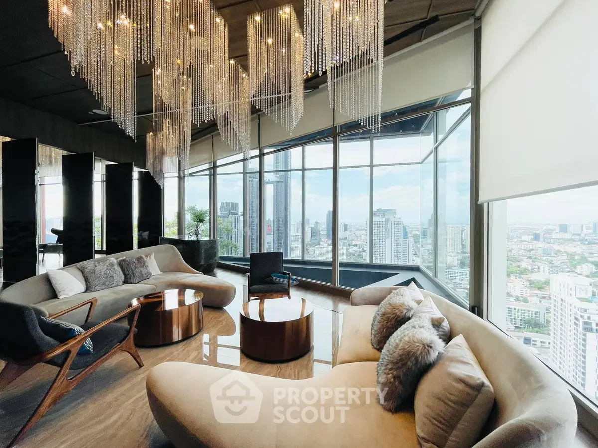 Luxurious living room with stunning city view and elegant chandeliers