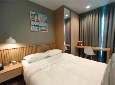 Cozy modern bedroom with stylish decor and ample natural light