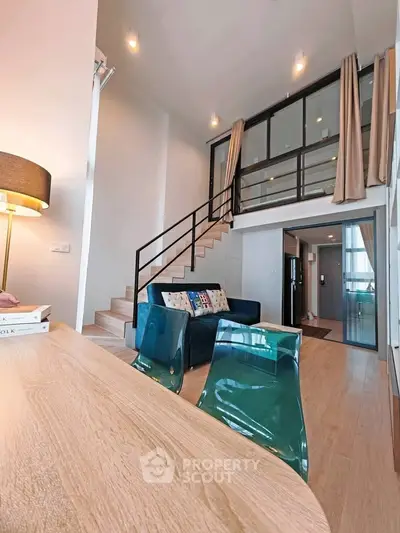 Modern loft apartment with stylish open layout and high ceilings