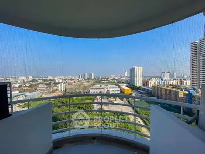 Stunning balcony with panoramic city view in high-rise building
