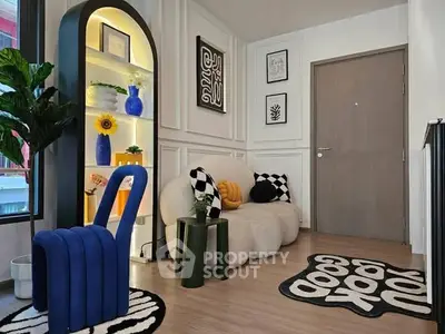 Stylish modern living room with unique decor and cozy seating area.