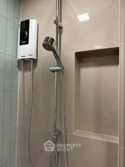 Modern bathroom shower with sleek design and water heater installation