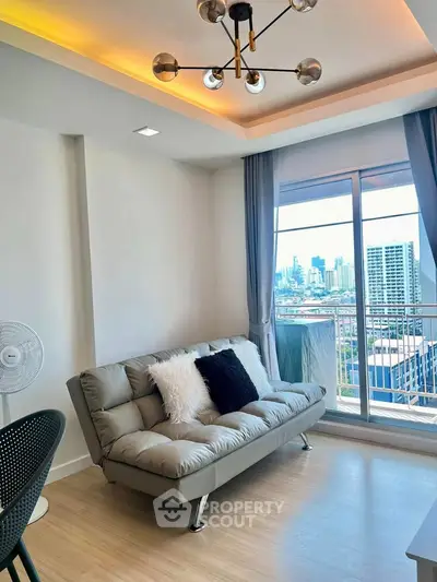 Modern living room with stylish sofa and city view from large window, perfect for urban living.