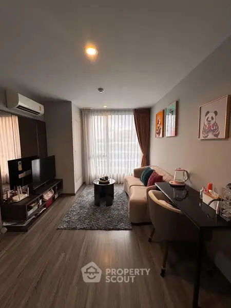 Modern living room with cozy sofa and stylish decor