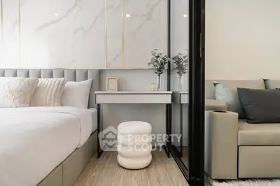 Luxurious modern bedroom with elegant decor and plush furnishings
