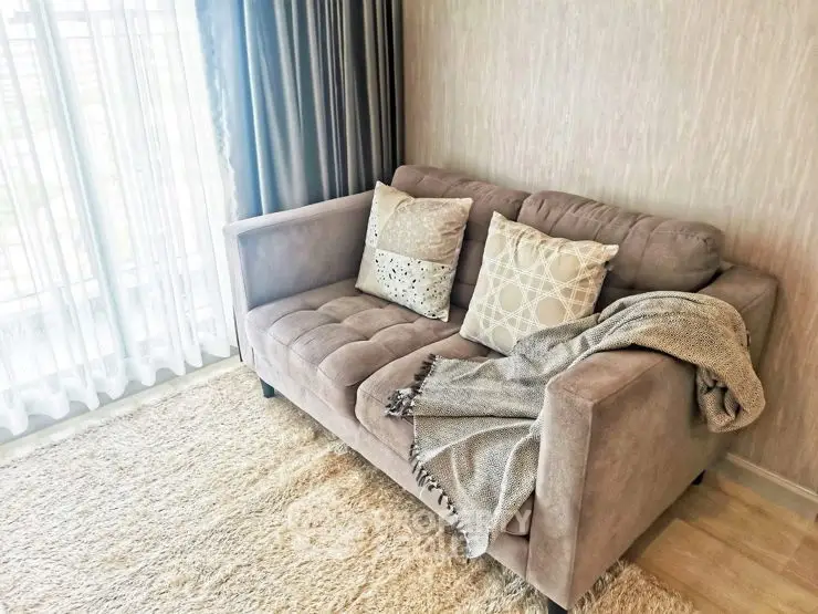 Cozy living room with plush sofa and elegant decor