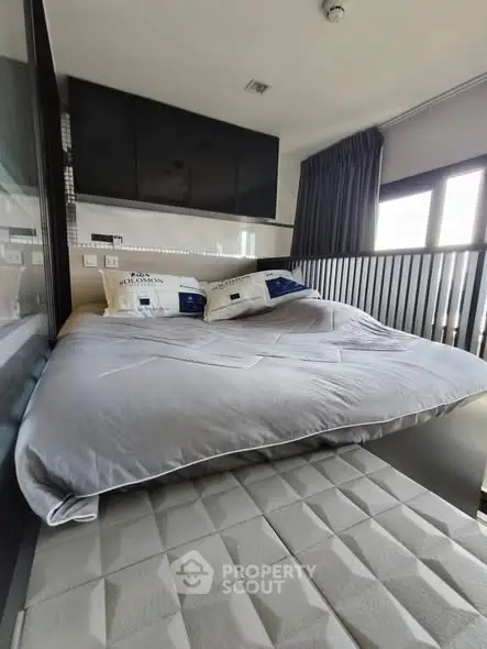 Modern bedroom with loft bed and stylish decor