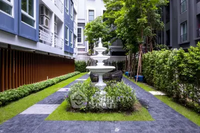 Charming garden courtyard with elegant fountain and lush greenery in modern residential complex.