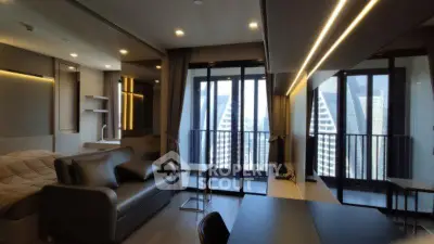 Modern studio apartment with sleek design and city view balcony