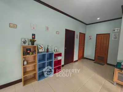 Spacious living room with modern decor and ample storage space