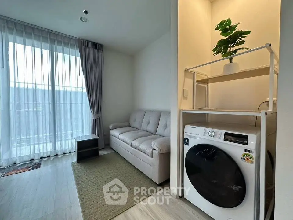 Cozy living room with modern washing machine and elegant decor