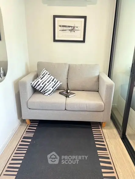 Cozy small living room with modern sofa and stylish decor