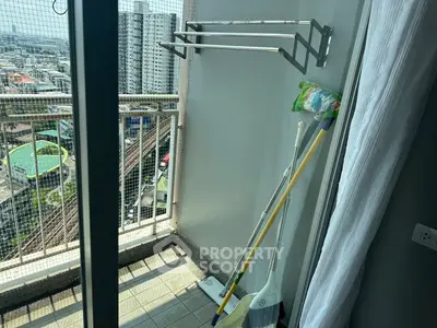 Charming balcony with city view, perfect for relaxation and enjoying the skyline.