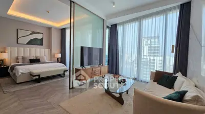 Luxurious modern bedroom with stylish living area and floor-to-ceiling windows
