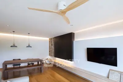 Modern living room with sleek wooden furniture and minimalist design