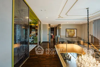 Luxurious duplex interior with elegant chandelier and modern decor