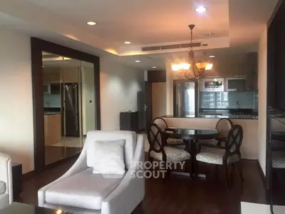 Spacious modern living room with open kitchen and elegant dining area