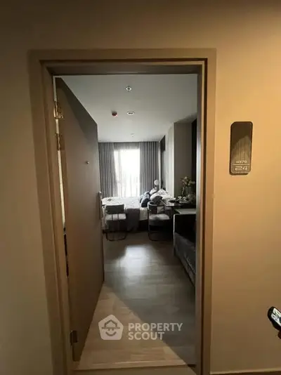 Modern bedroom entrance with cozy interior and natural light