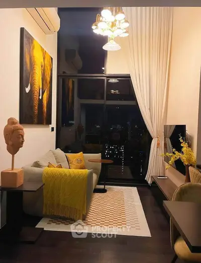 Stylish living room with modern decor and city view, featuring elegant lighting and cozy seating area.