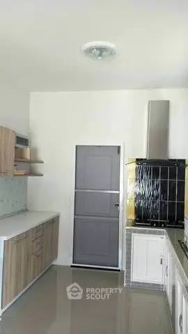 Modern kitchen with sleek cabinetry and stainless steel appliances