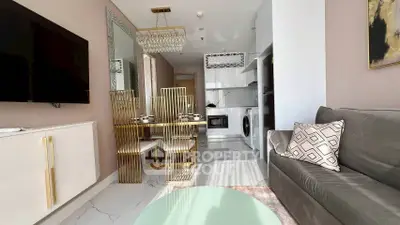 Modern living room with chic dining area and sleek kitchen appliances