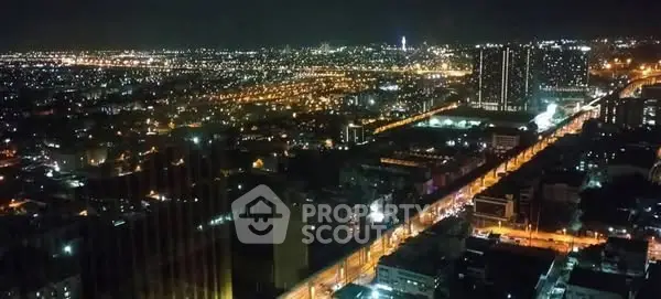 Stunning cityscape night view showcasing vibrant urban lights and skyline.