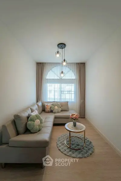 Cozy living room with modern decor and natural light