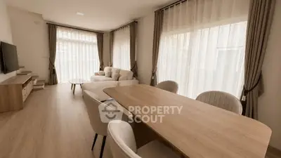 Spacious modern living room with elegant decor and natural light