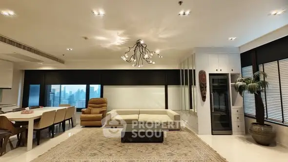 Spacious modern living room with elegant decor and city view