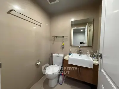 Modern bathroom with sleek fixtures and neutral tones