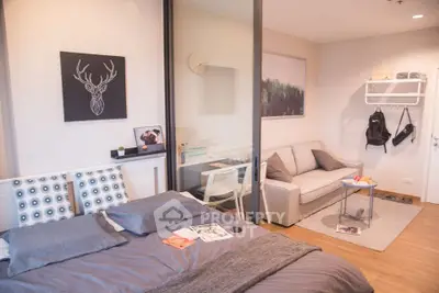 Modern studio apartment with stylish decor and cozy living area