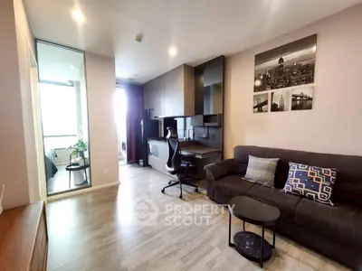 Modern living room with stylish decor and workspace in a bright apartment