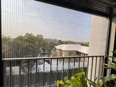 Stunning balcony view with lush greenery and modern architecture.