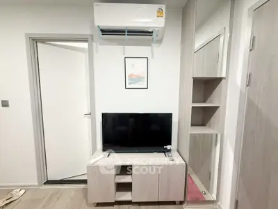 Modern living room with air conditioning and stylish TV stand