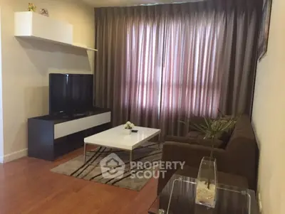 Cozy living room with modern decor and natural light