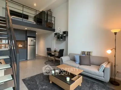 Modern loft apartment with open living area and stylish mezzanine bedroom.
