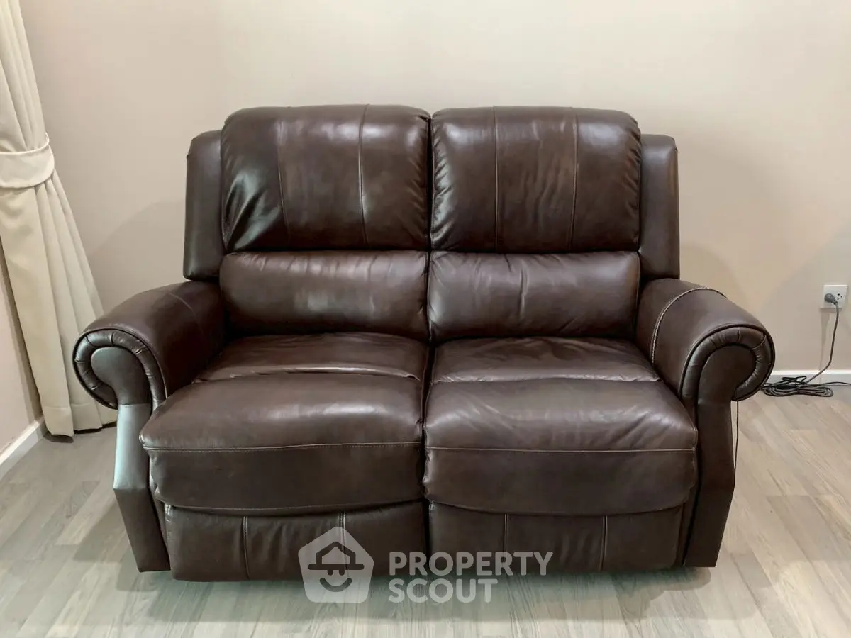 Luxurious brown leather sofa in a modern living room setting