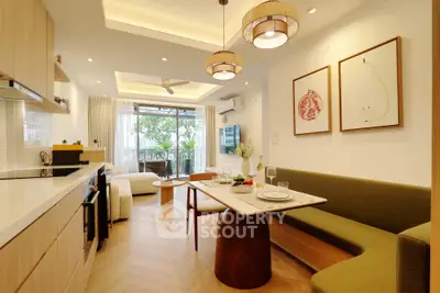 Modern open-plan living room with stylish decor and natural light