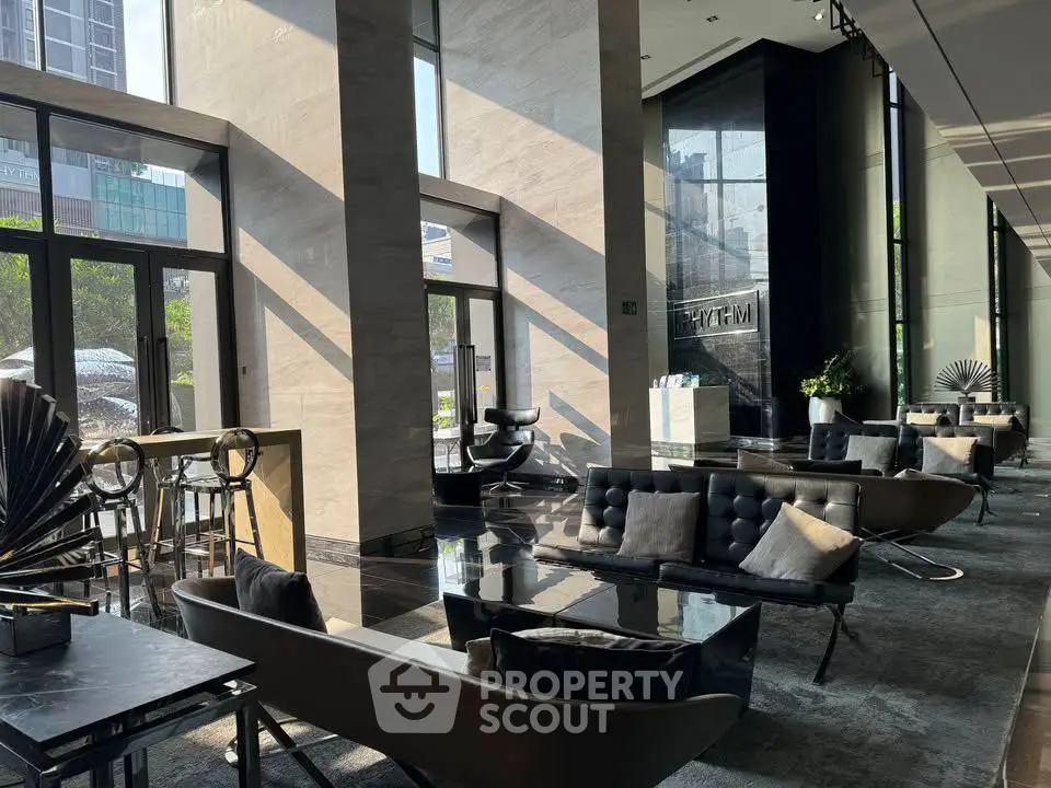 Luxurious modern lobby with stylish seating and large windows