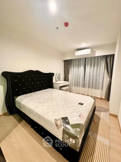Modern bedroom with stylish bed and elegant decor in a cozy apartment