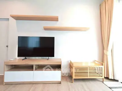 Modern living room with sleek TV stand and floating shelves, bright natural light, and elegant curtains.
