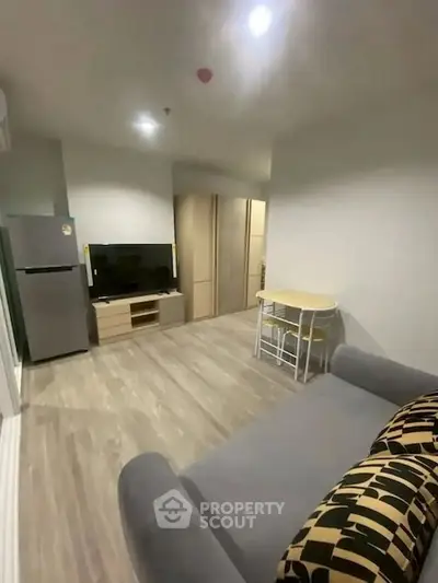 Modern living room with sleek furniture and open layout design