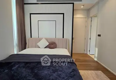 Modern bedroom with stylish decor and cozy bedding