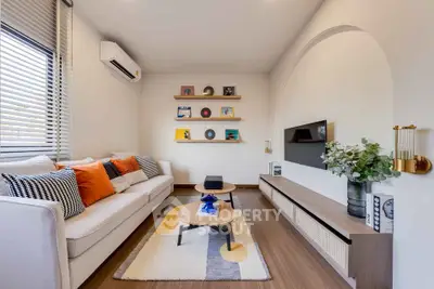 Modern living room with stylish decor and cozy seating area